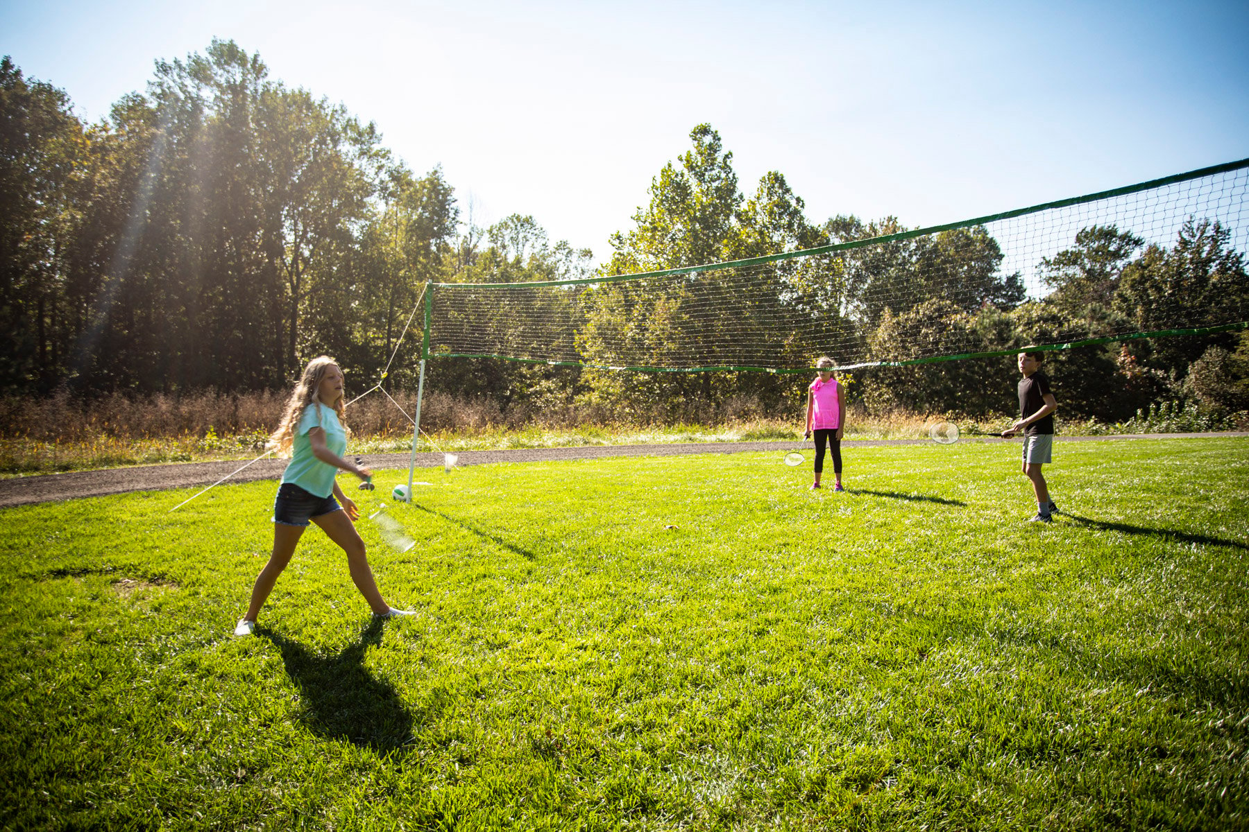 Family enjoying healthy lawn