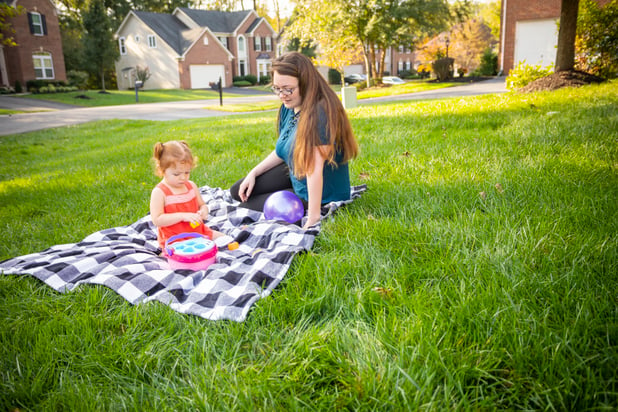 Family in backyard with no mosquitoes