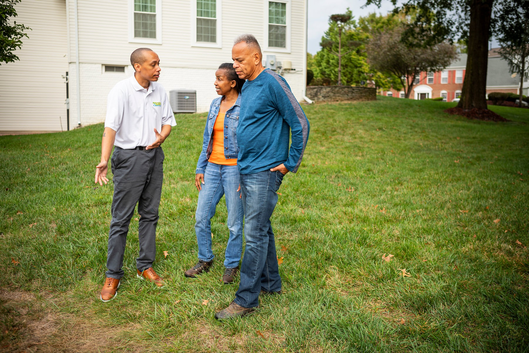 lawn care service technician and customers