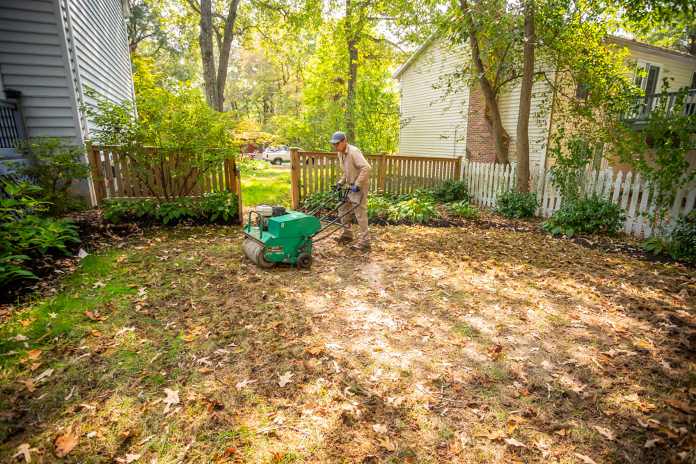 lawn care team aerating